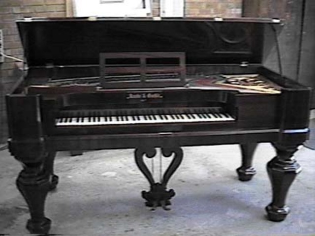 square grand piano.