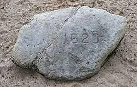 Pilgrims land at Plymouth Rock.