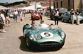 Gets hired by Aston Martin