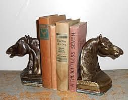 Bronze horse and books