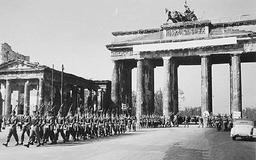 Germany surrenders to the western Allies and to the Soviets