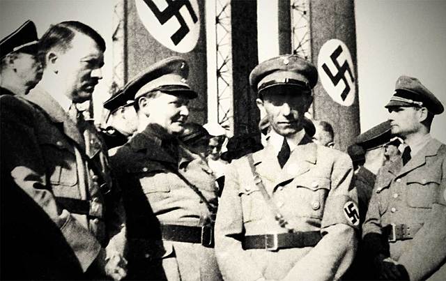 Hitler declares legal unity of the German state and Nazi Party.