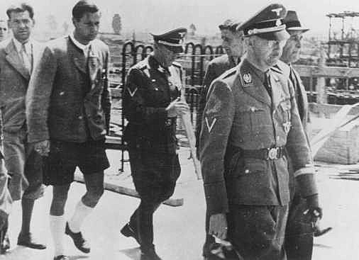 Himmler makes his first visit to Auschwitz.