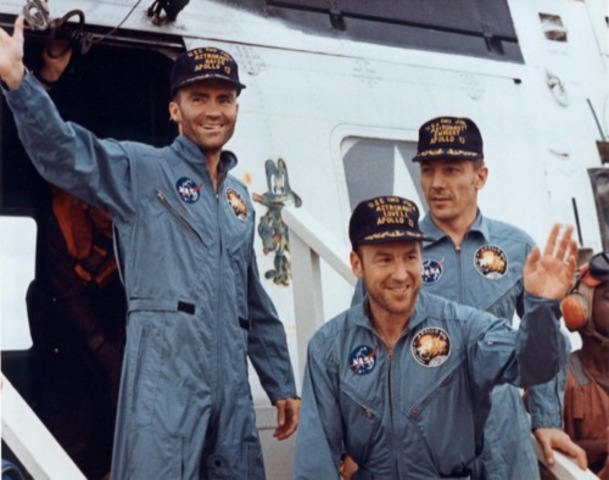 Apollo 13  (barely) returns home.