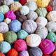 122220124 colorful background made of many wool yarn balls