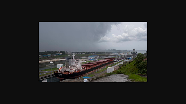 The Panama Canal opens for business.