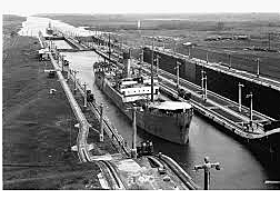 The Panama Canal opens for business.