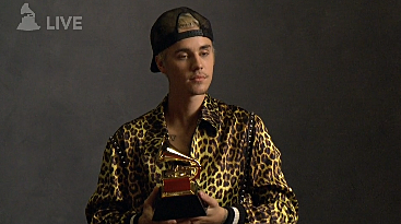 Justin Bieber and his grammy.