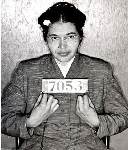 Rosa Parks refuses to give up her seat in a bus