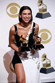 After working as a model, she signed with Warner Music Group in 2015.