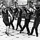American woman teaching english boys to dance the charleston great britain 19251