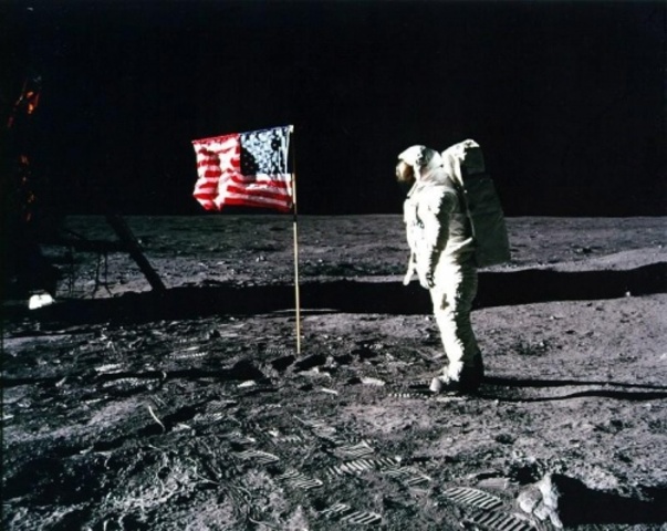 Neil Armstrong take first steps on the moon