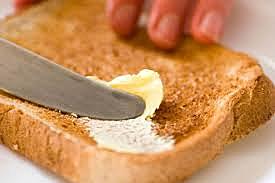 Buttering toast