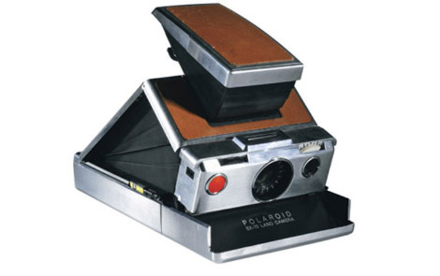 Polaroid introduces one-step instant photography with the SX-70 camera