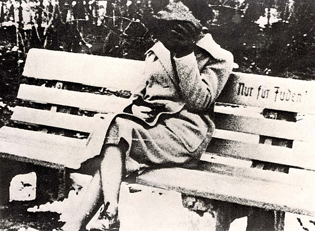 Mietek and his friends refusing to sit on "Jewish benches" at Jagiellonian University.