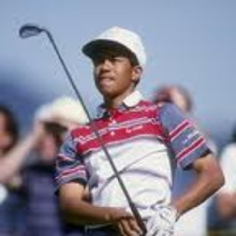 Tiger Woods wins a junior championship.