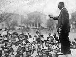 Booker T. Washington delivered his “Atlanta Compromise” speech