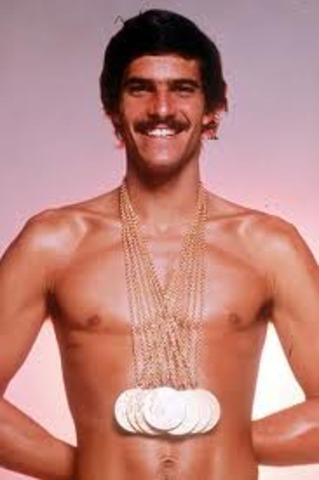 Mark Spitz wins seven gold medals