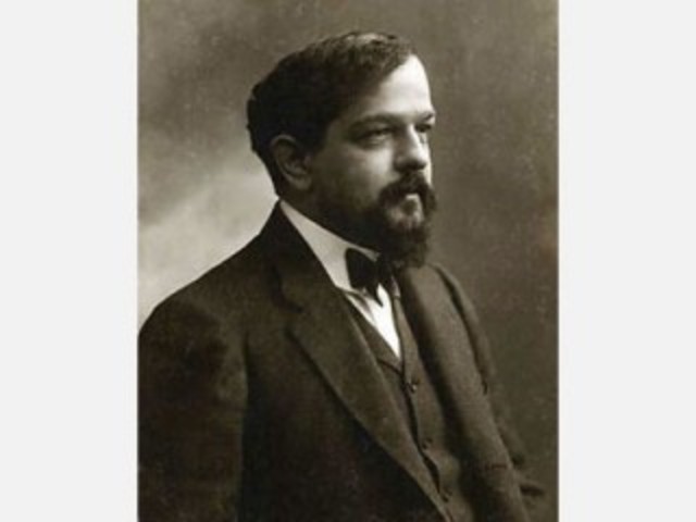 Claude Debussy, French impressionist composer, dies