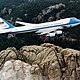 800px air force one over mt. rushmore