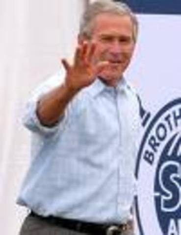 President George W. Bush signs into law the No Child Left Behind Act.