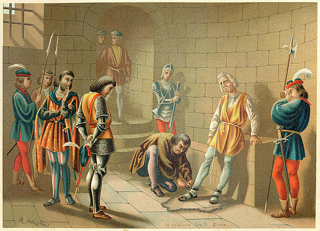 Columbus is arrested and sent home in chains.