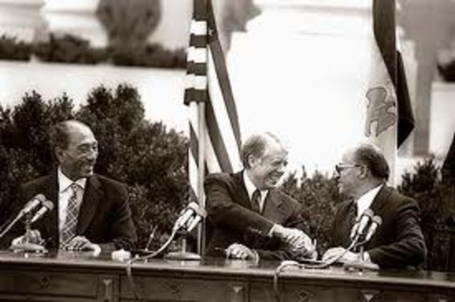Jimmy Carter negotiates the Camp David Accords to promote peace in the Middle East