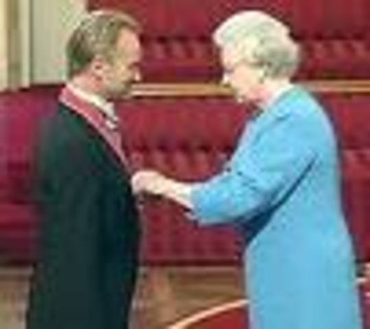 Rock star Sting is made Commander of The British Empire for services to the music industry.