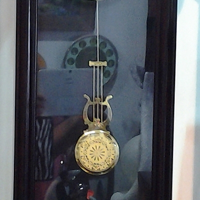 Timeline: A wooden pendulum clock
