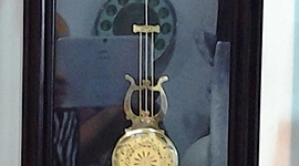 Timeline: A wooden pendulum clock