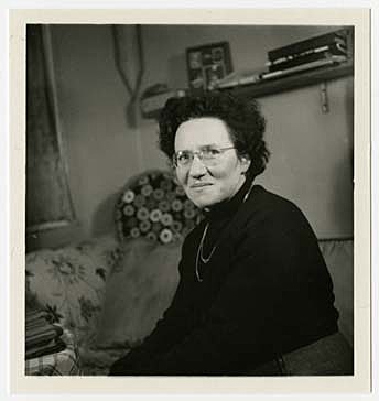 Child Survivors Receive Help from Relief Workers