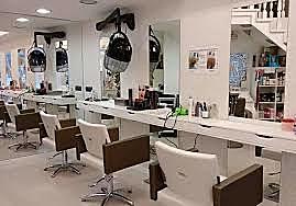 SHE GETS THE TITLE OF HAIRDRESSER