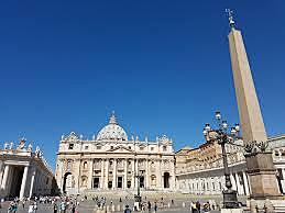 I would travel to Italy to visit Vatican City with my parents