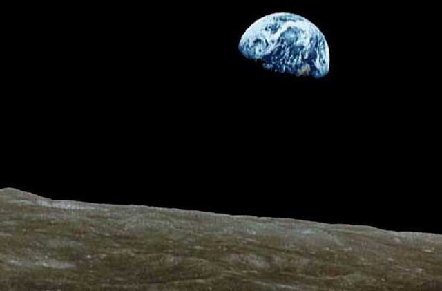 Frank Borman, James Lovell, and William Anders begin the first manned journey from the Earth to the Moon. On Christmas Eve they take turns reading Genesis in a broadcast heard around the world