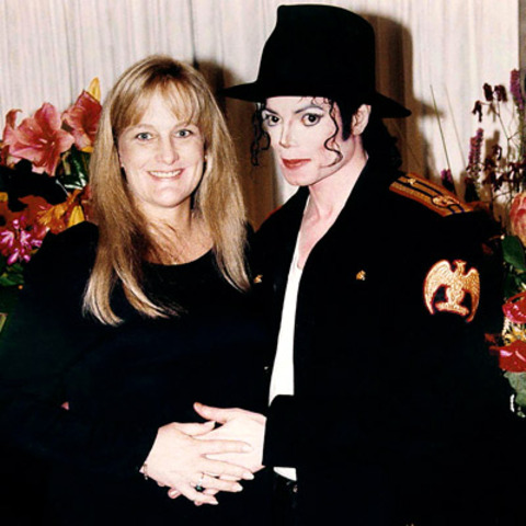 Marries nurse Debbie Rowe