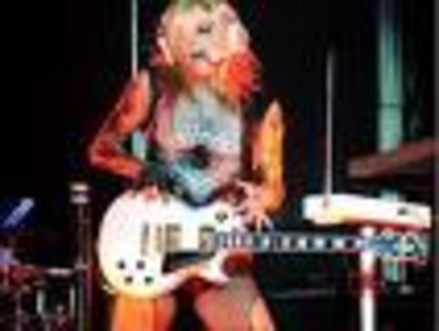 kesha plays and instrament?