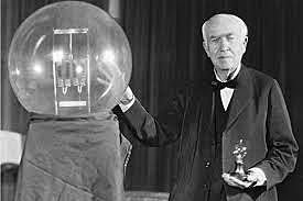 Thomas Edison tests his first light bulb.