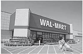 Sam Walton Opens First Walmart