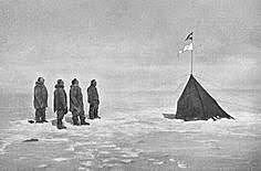 Roald Amundsen and his team become the first people to stand at the South Pole