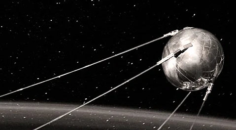 Russians Launch Sputnik; "Space Race" Begins