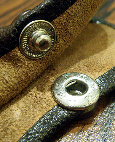 Botón a presión o automático