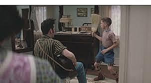 Forrest dances to Elvis Presley