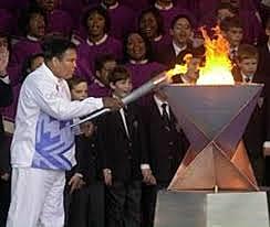 A parkinson's diagnosed lights Olympic Flame