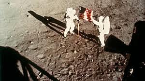 Armstrong and Aldrin walk on the moon
