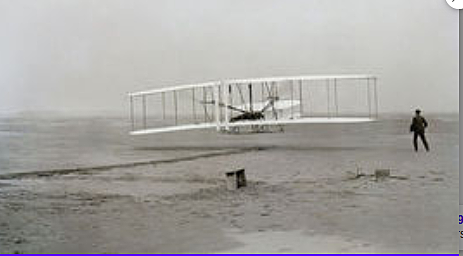 Orville and Wilbur Wright Fly the First Motorized Airplane