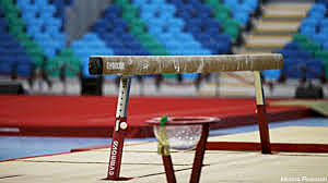 fell off beam at gymnastics competition