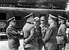 Hitler firma el armisr¡ticio.