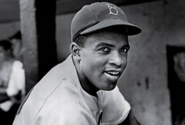 Jackie Robinson becomes the first black major league baseball player.