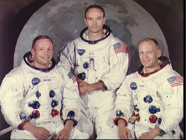 Neil Armstrong and Buzz Aldrin become the first men to walk on the Moon with Apollo 11