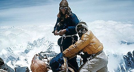 Edmund Hillary climbs Mt Everest
